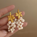 French retro pearl tassel earrings with a niche design and fairy like temperament