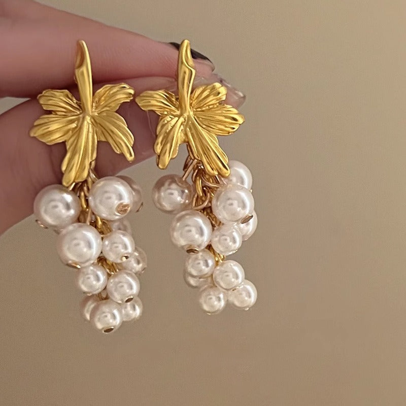 French retro pearl tassel earrings with a niche design and fairy like temperament