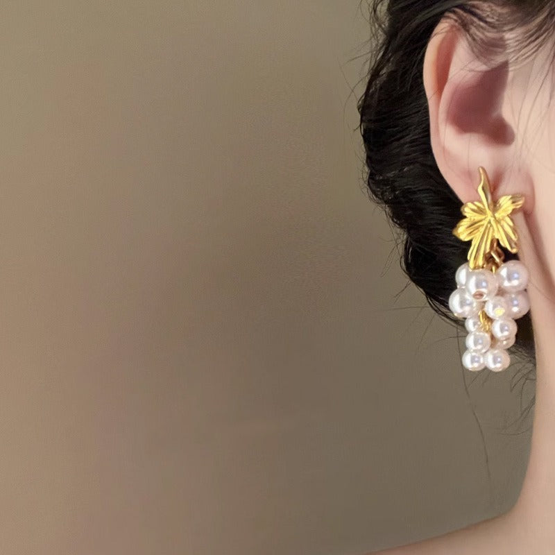 French retro pearl tassel earrings with a niche design and fairy like temperament